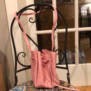 Free People pink crossbody bag with long strap
